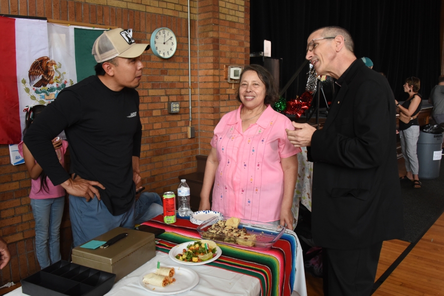 Bishop James Ruggieri, Sister Miriam, and Eduardo Anzurez.
