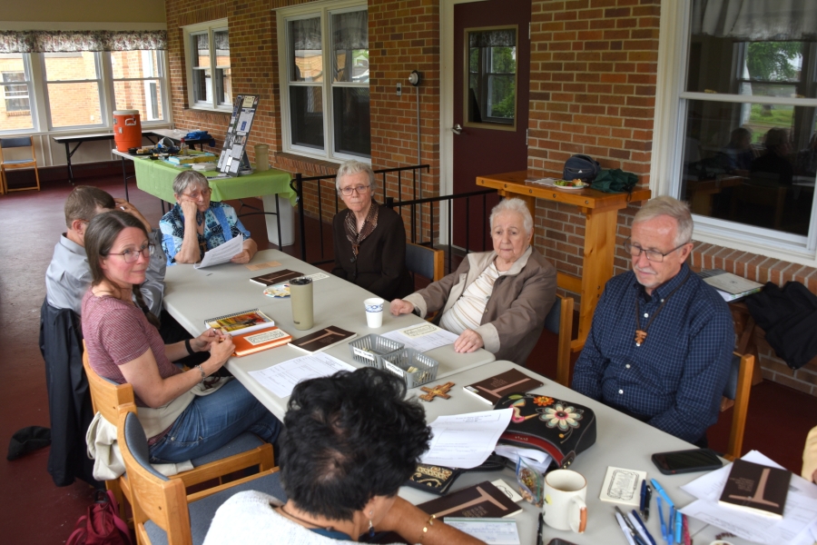 Members of the St. John the Baptist Fraternity holding a meeting.