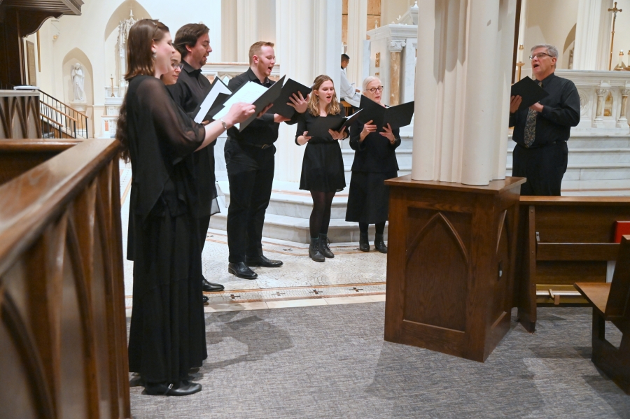 Members of the choir singing.