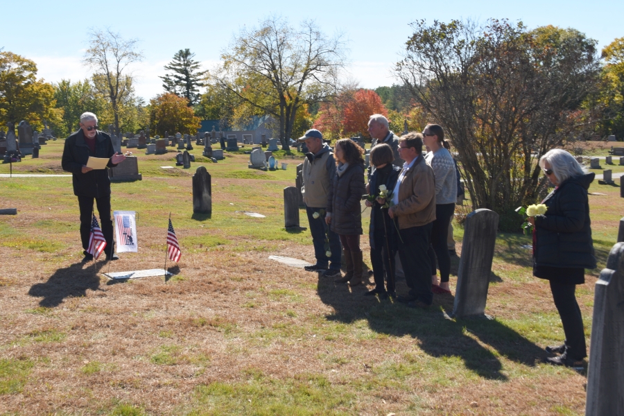 Family members gathered around Joseph Tardiff's grave.