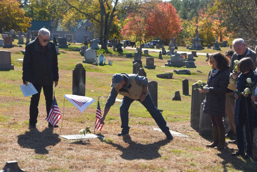 A rose is placed on Joseph Tardiff's grave.