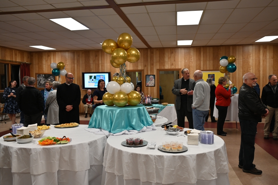 Room with round tables and balloons