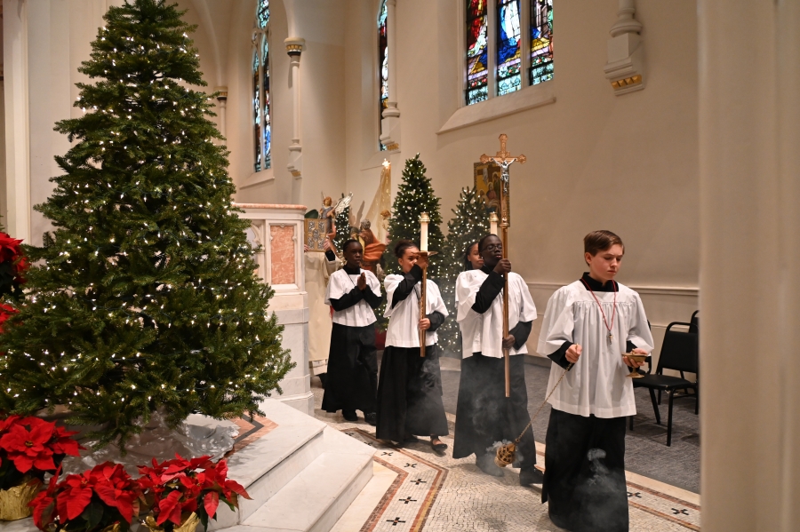 Altar servers enter the cathedral