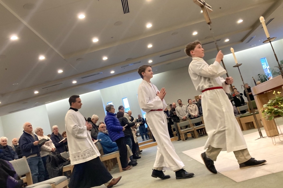 St. James students process into Mass.