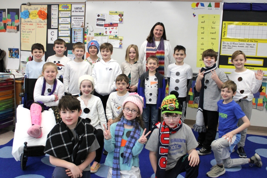 Students at All Saints Catholic School dress like snowmen.