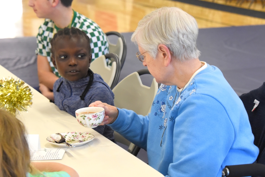 Sister Ruth Conlogue and a student