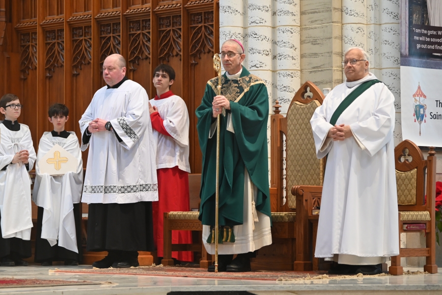 Bishop James Ruggieri, Peter Czerwinski, and Deacon Irenee Richard, OP.