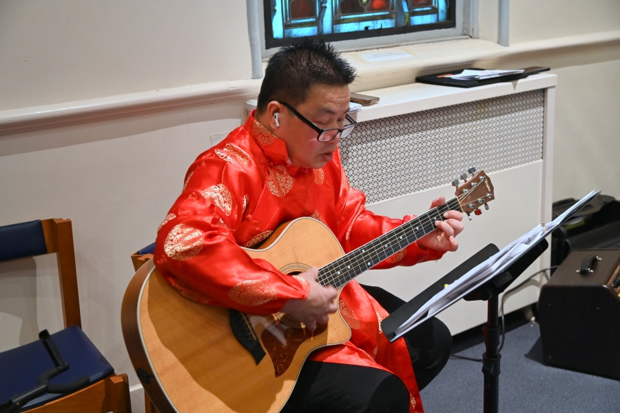 Man playing the guitar