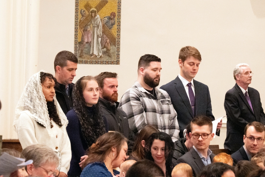A family entering the church.
