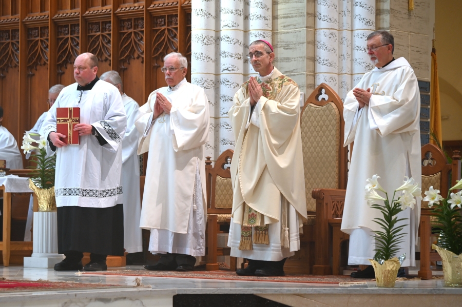 Bishop Ruggieri with Peter Czerwinski and Deacon Frank Daggett on his right and Deacon Peter Bernier on his left.