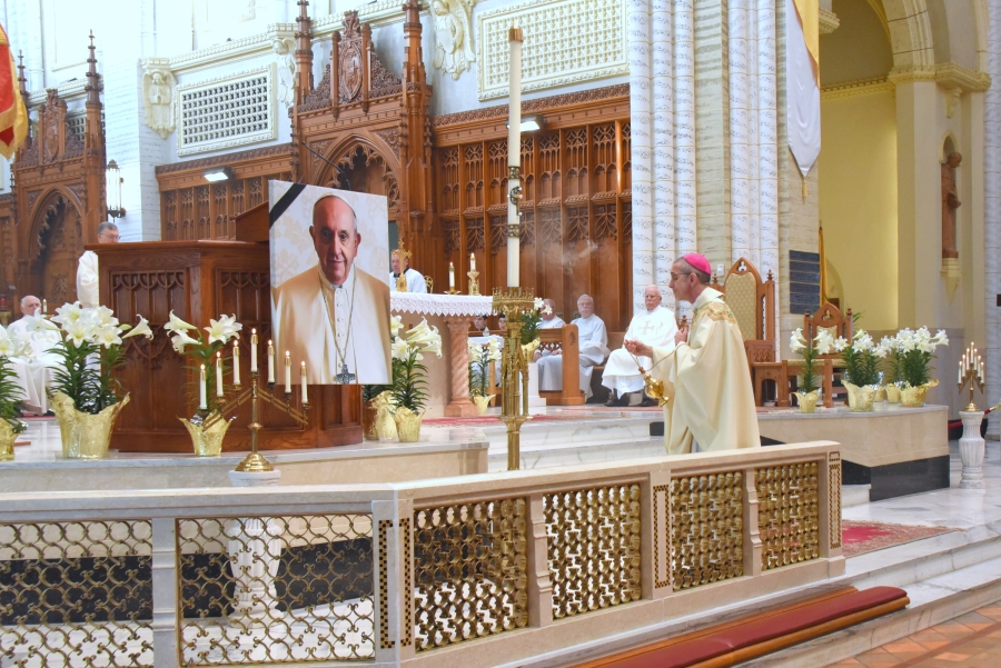 Bishop Ruggieri incenses a portrait of Pope Francis