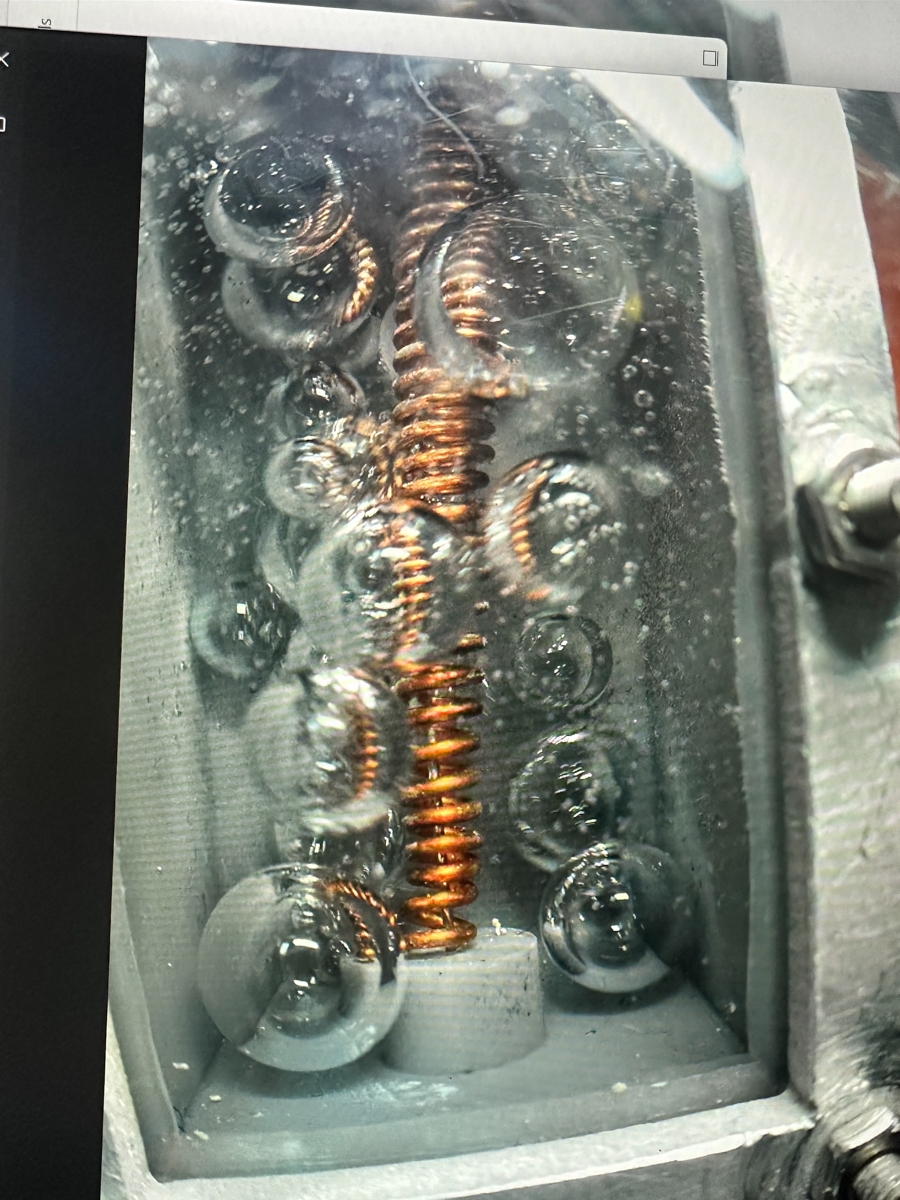 Water and gas bubbling together in microgravity