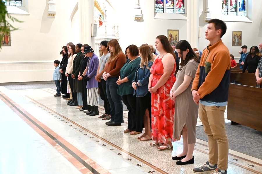 Neophytes lined up at the front of the church.
