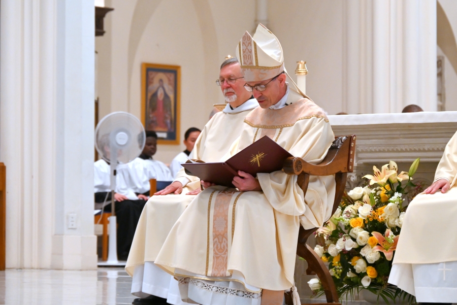 Bishop Ruggieri reads his homily.