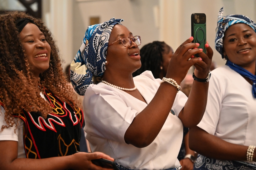 People in the pews celebrating.