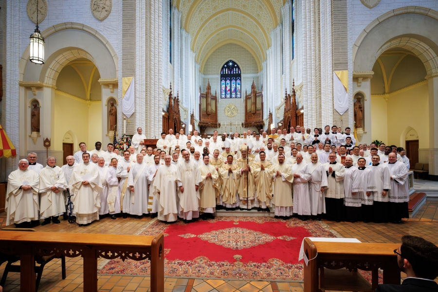 Group photo of bishops, priests, deacons, and servers.