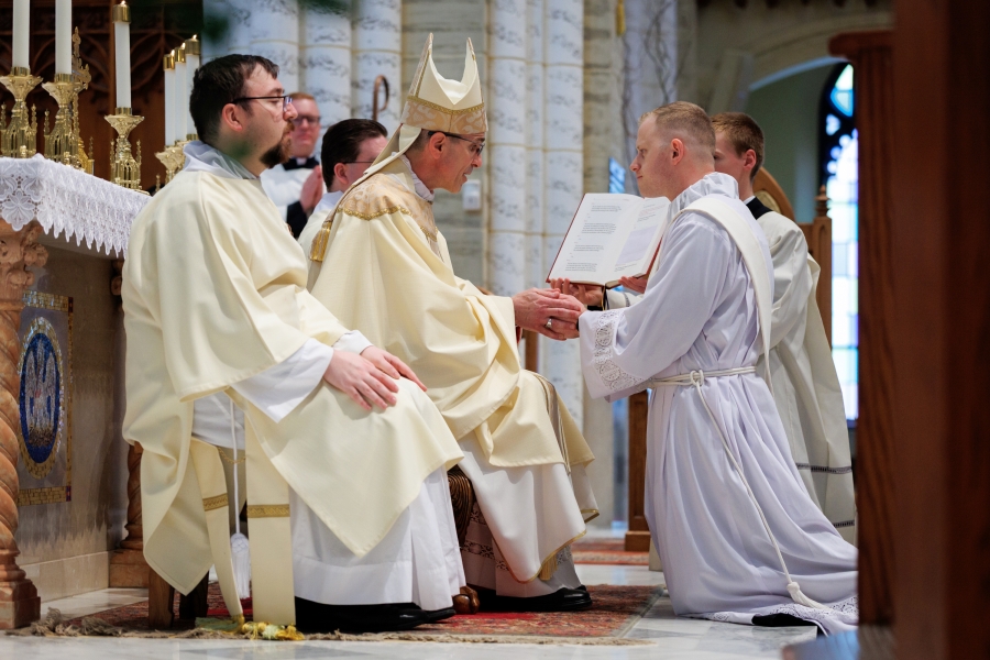 Deacon Erin Donlon promises obedience to the bishop and his successors.