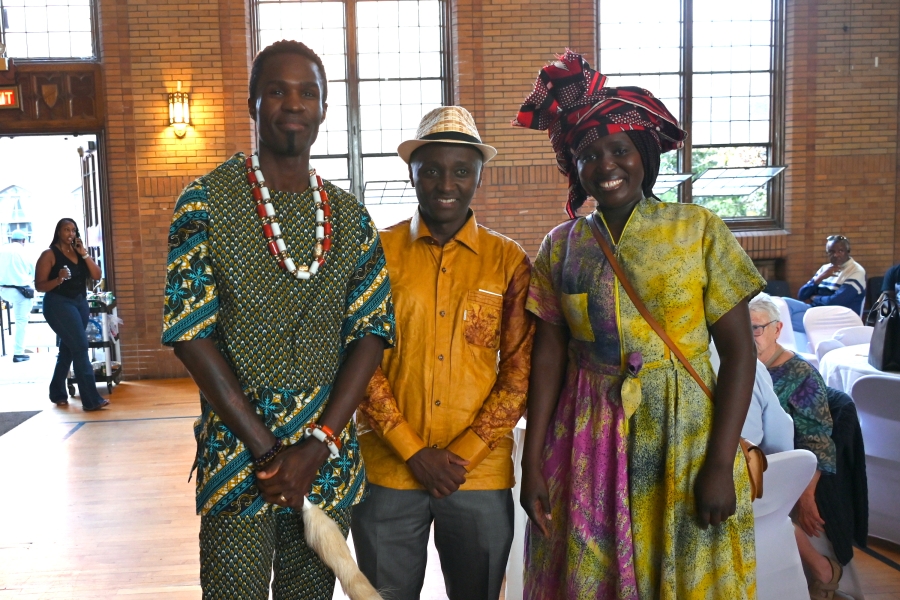 Three people posed.