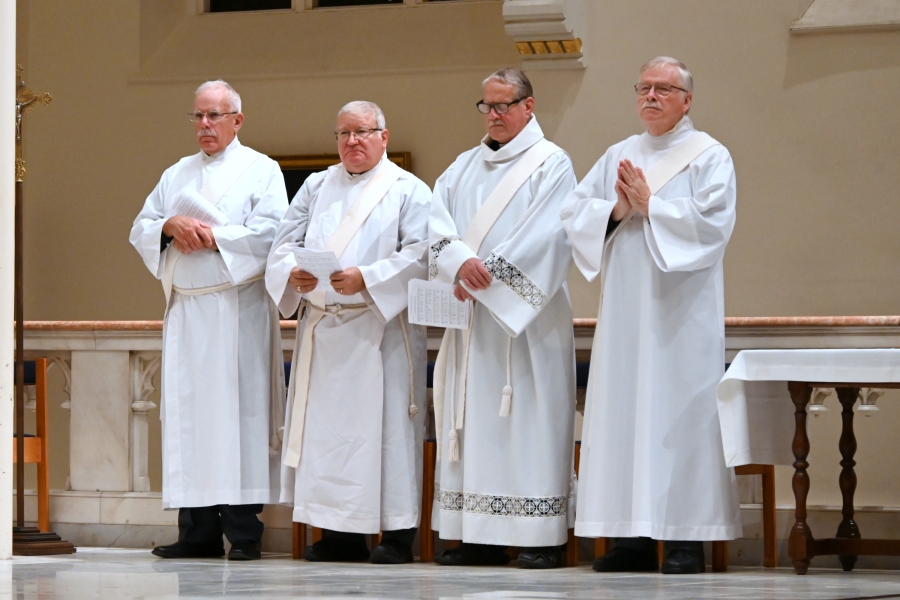 Four permanent deacons