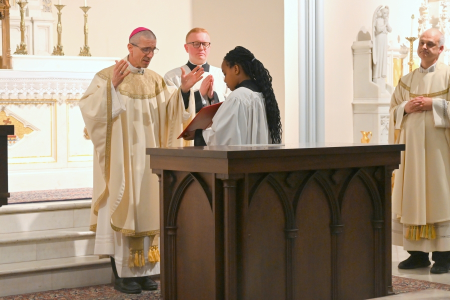 Bishop Ruggieri prays the Prayer of Consecration.