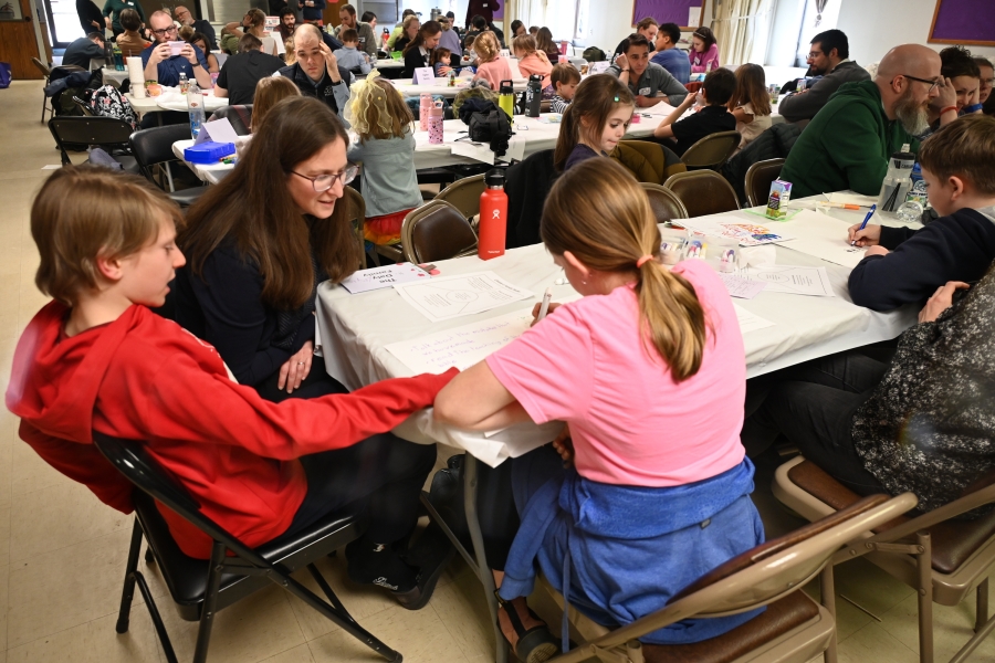 Families make posters.