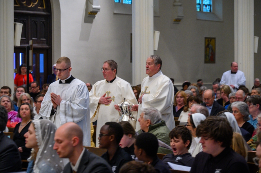 parishioners present oils