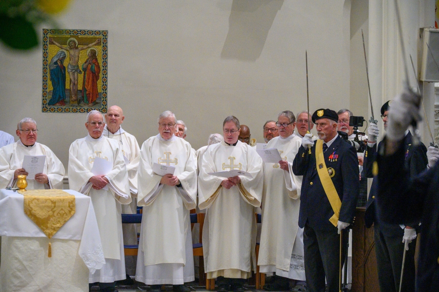 Deacons stand at beginning of Mass