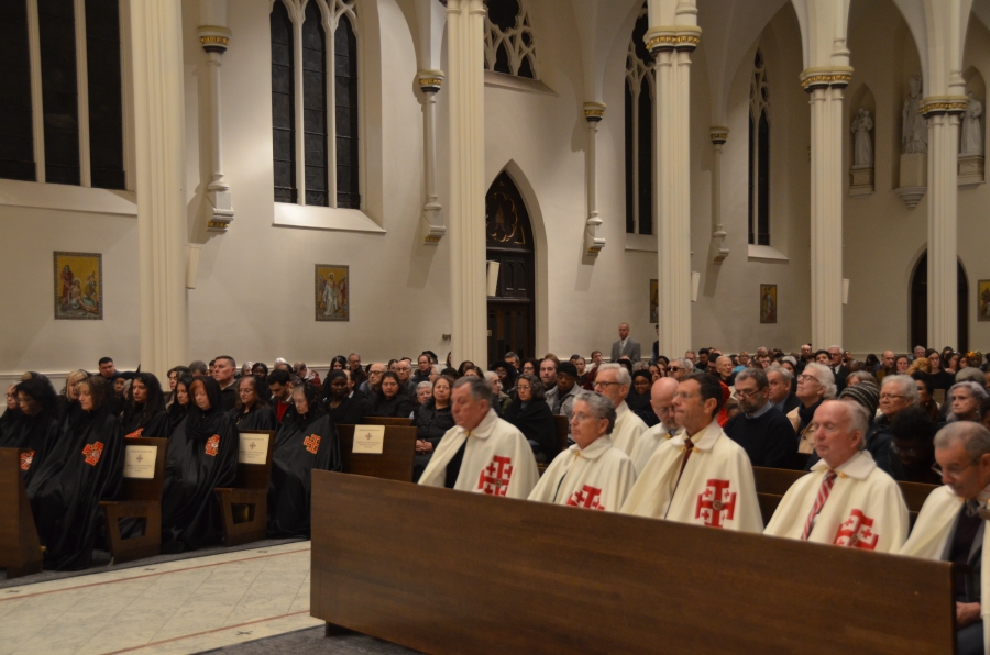 Crowd sitting in the pews