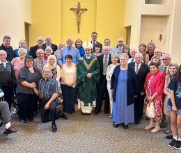 Couples with Bishop Ruggieri at the Silver and Gold Anniversary Mass 