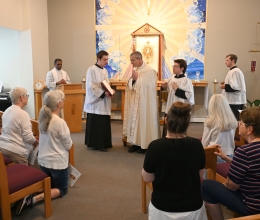 Bishop Ruggieri blesses the St. Monica Adoration Chapel.