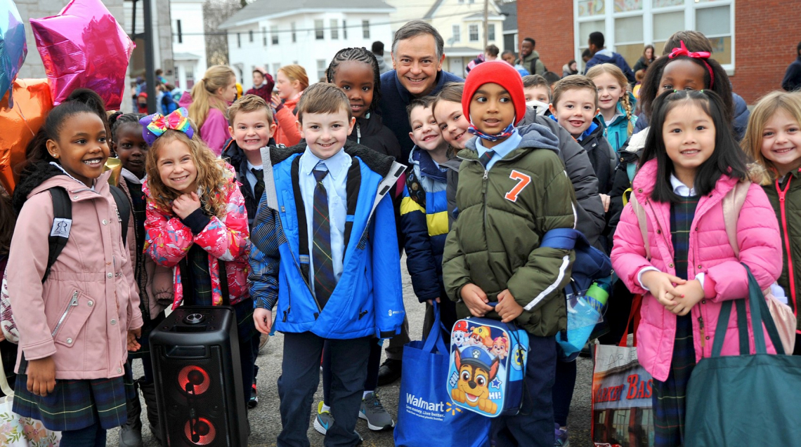 St. Brigid students and Principal William Burke