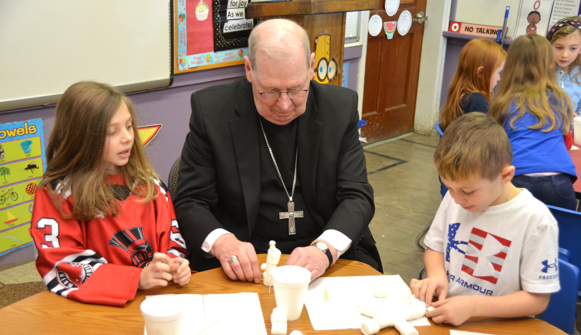 Bishop Deeley visits St. Dom's Lewiston campus during Maine Catholic Schools Week. 