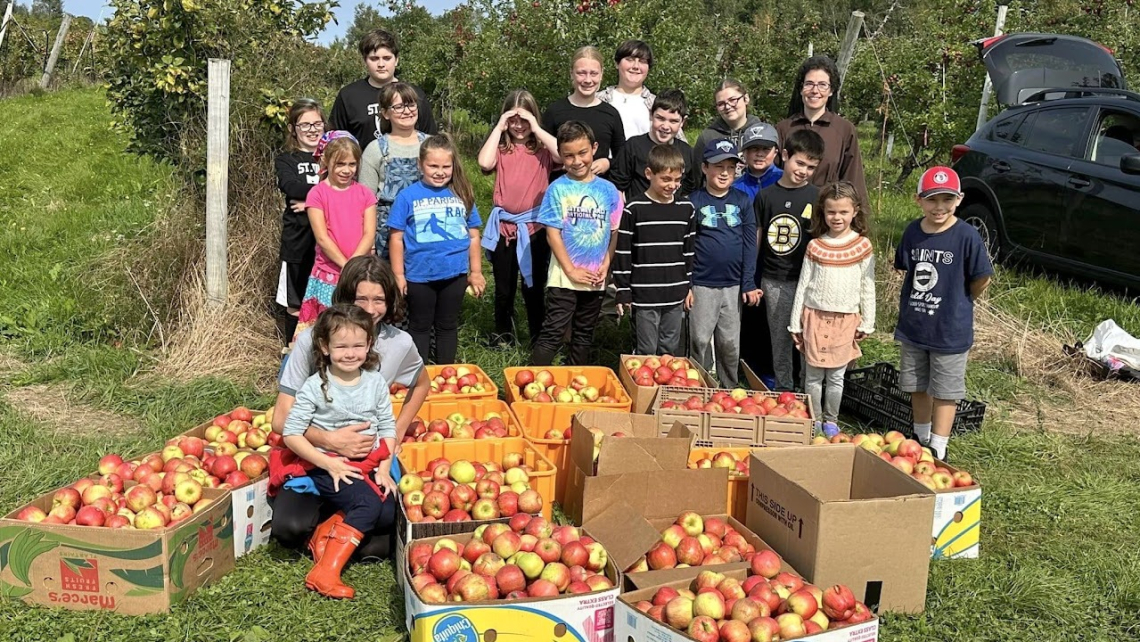 Students with apples