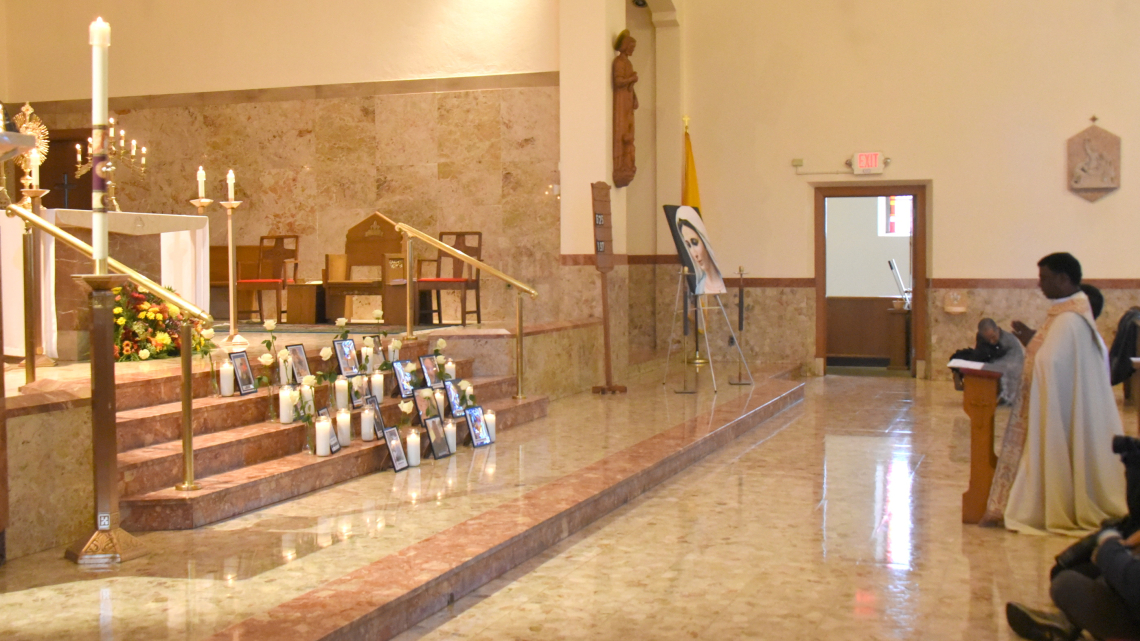 Father Raja Thaniyel before the Blessed Sacrament