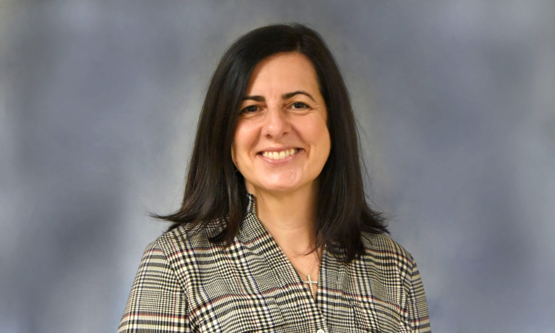 Headshot of woman with dark hair