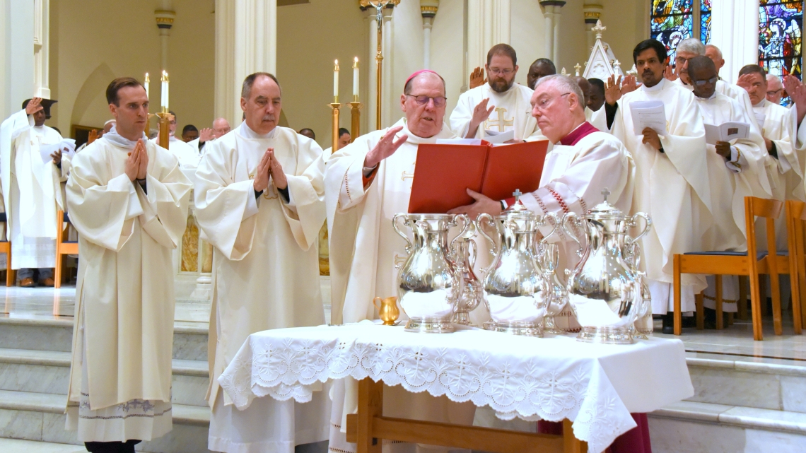 Bishop Deeley consecrates the oil of the chrism.