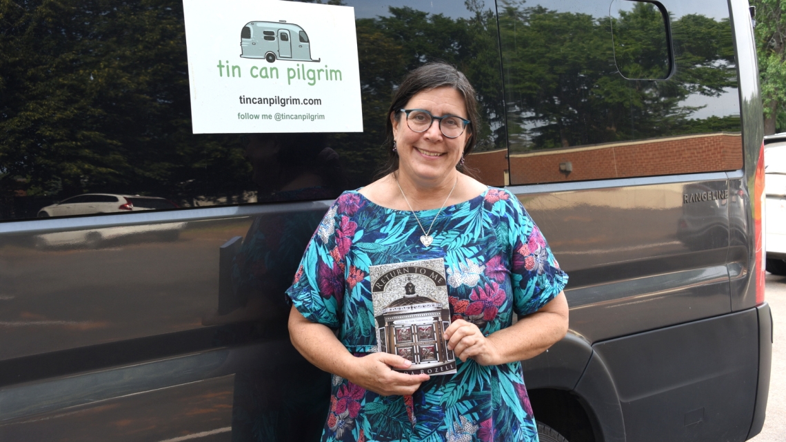 Lynda Rozell in front of her van