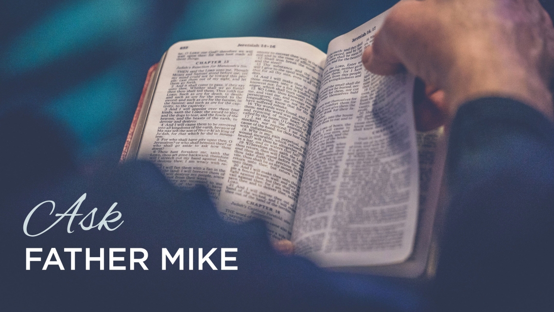 Bible with words "Ask Father Mike"