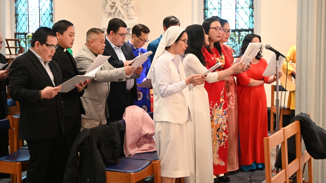 Choir members singing