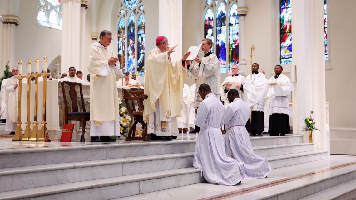 Bishop Ruggieri prays the Prayer of Ordination.