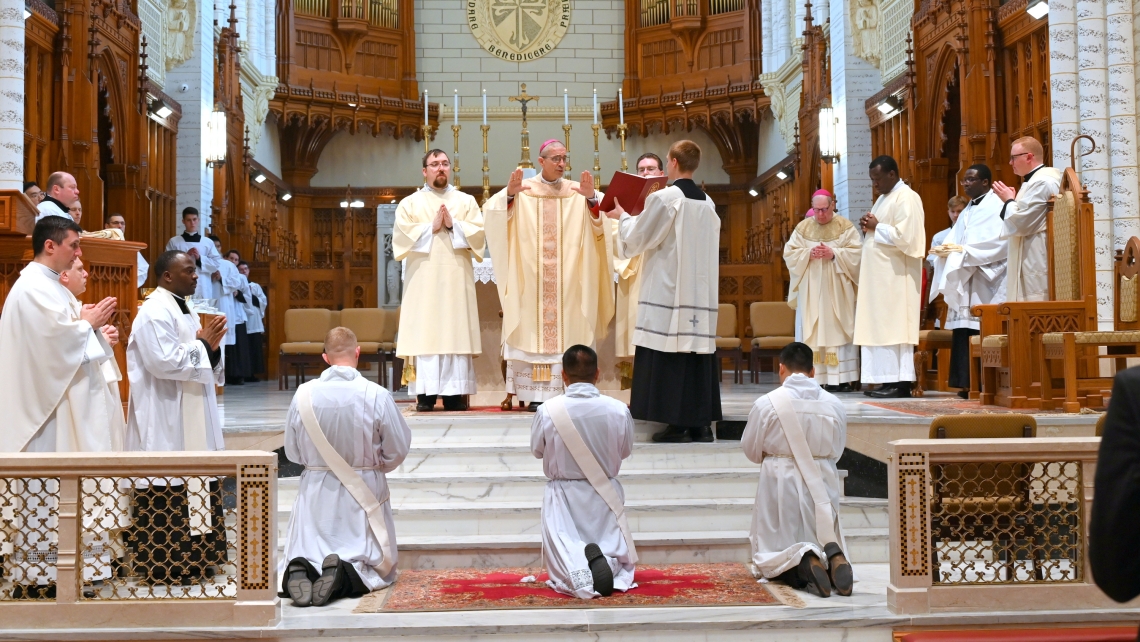 Bishop Ruggieri prays the Prayer of Ordination.