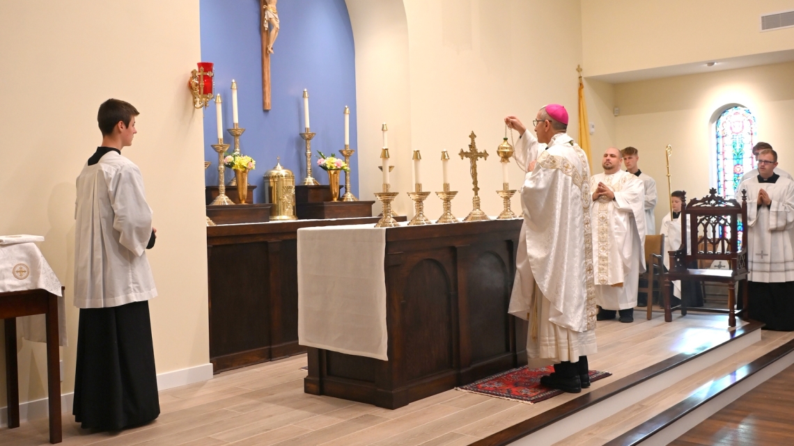 Bishop Ruggieri incenses the altar.