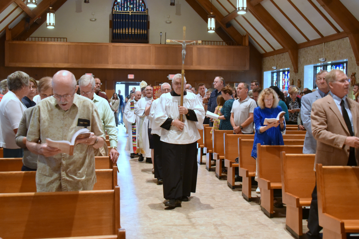 The opening procession of the 100th anniversary Mass at St. Rose of Lima Church in Jay, Maine.