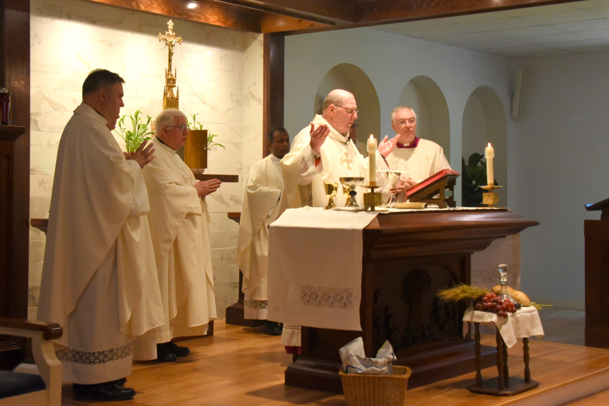 Bishop Robert Deeley celebrates the Eucharist