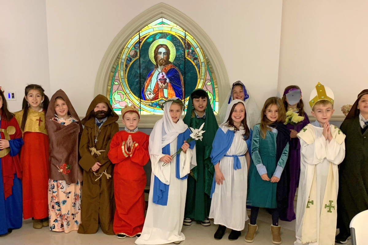 Students dressed as saints