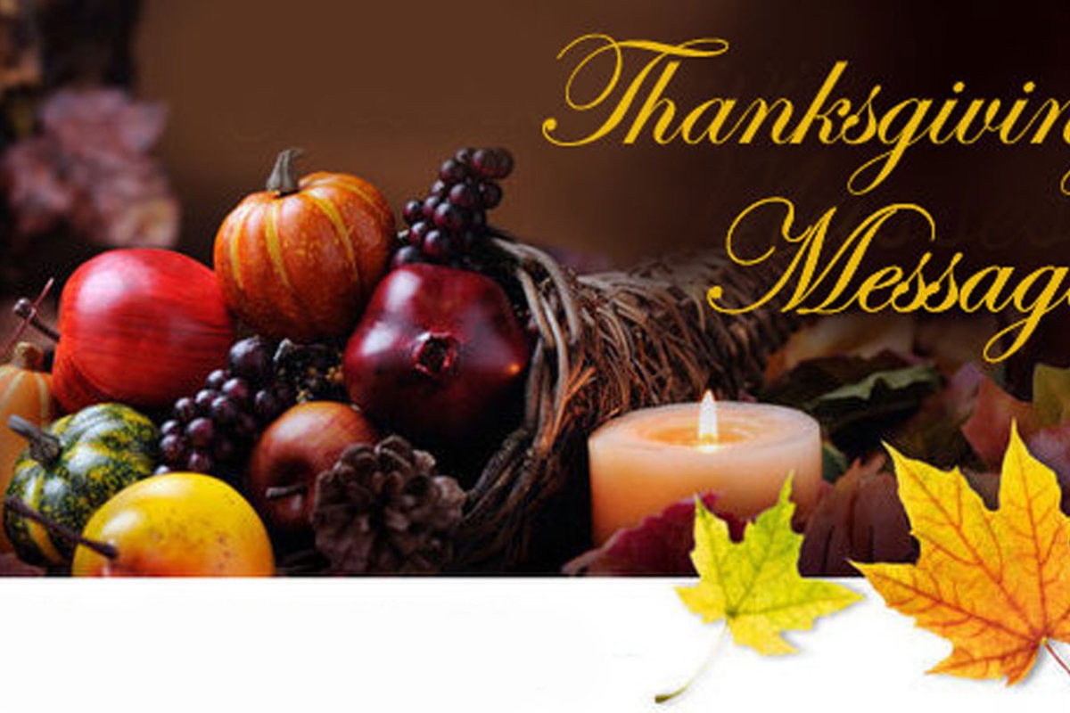 Photography of a cornucopia and candle with the words Thanksgiving Message