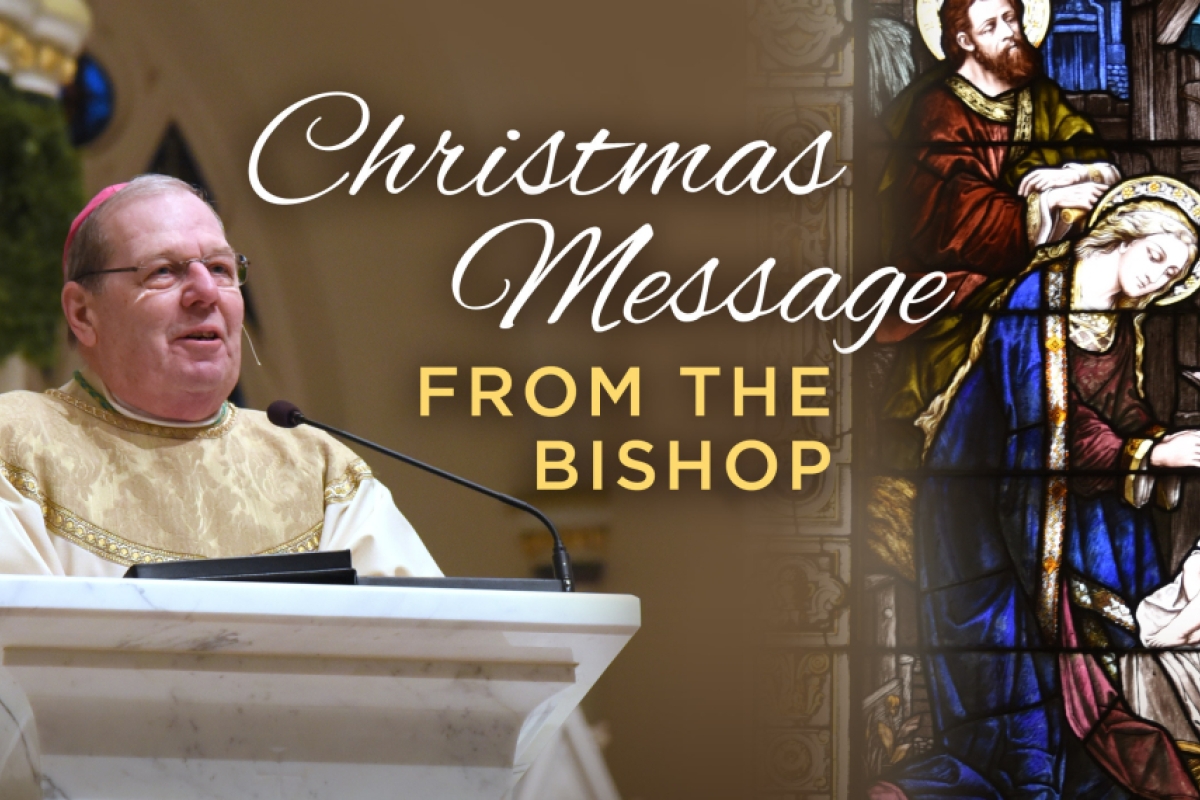 Bishop at altar with words Christmas Message from the Bishop