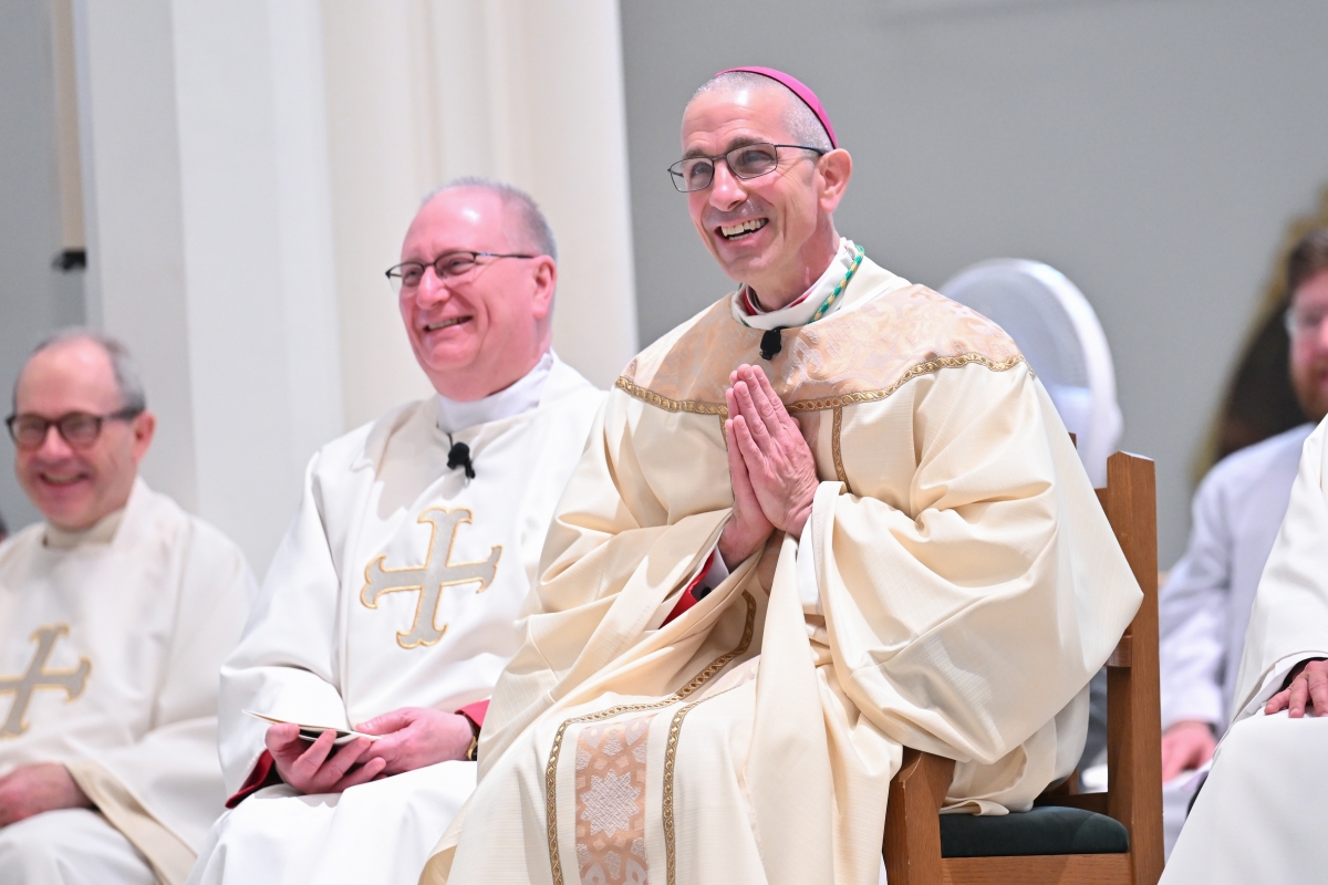 Bishop Ruggieri and Msgr. Dubois laughing during Bishop Ruggieri's ordination Mass.