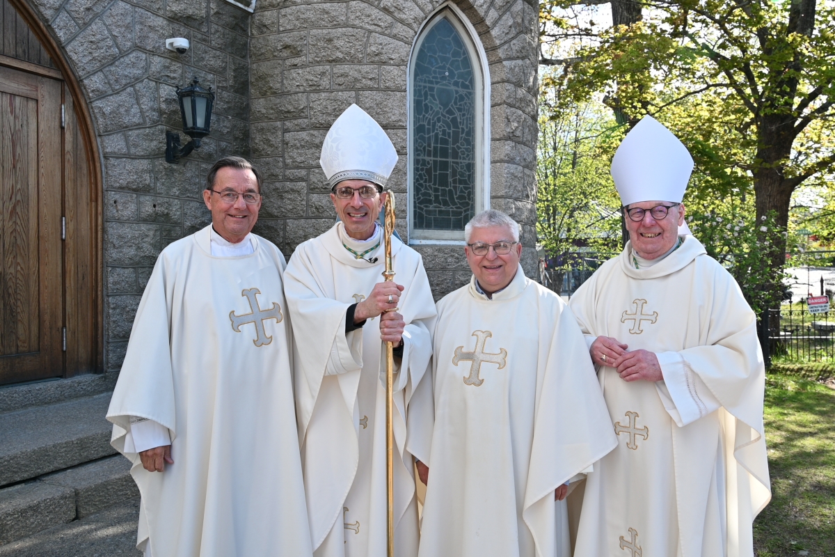 Group of four priests