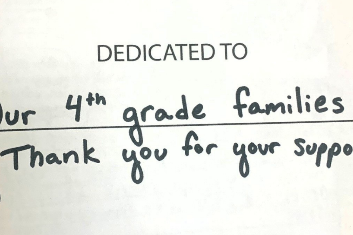the dedication in the Christmas cookie cookbook. "Dedicated to our 4th grade families, thank you for your support"